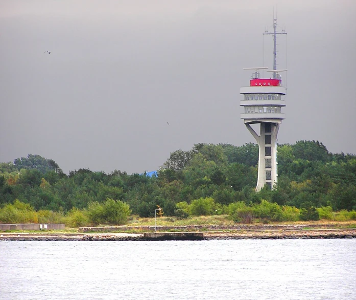 a tall tower with a flag on it