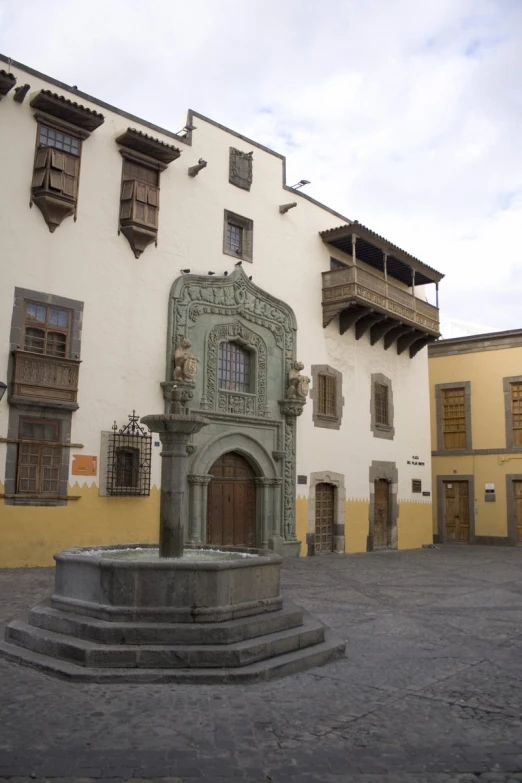 a courtyard in front of an old building