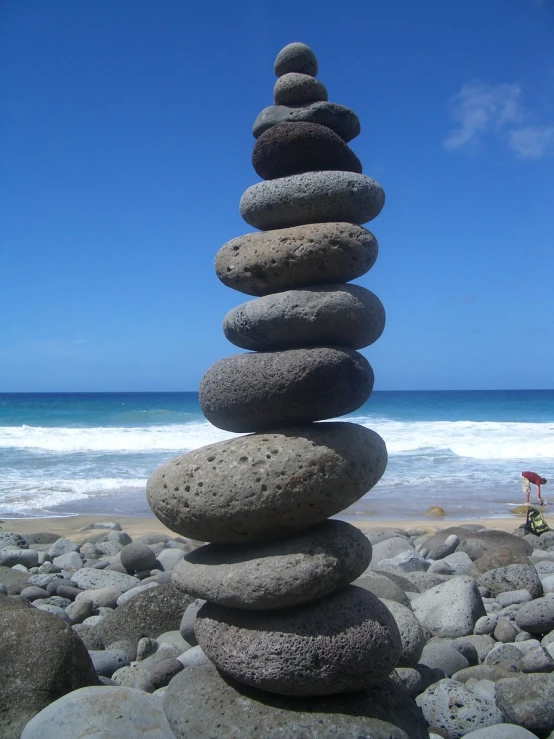 an image of a stack of rocks near the beach