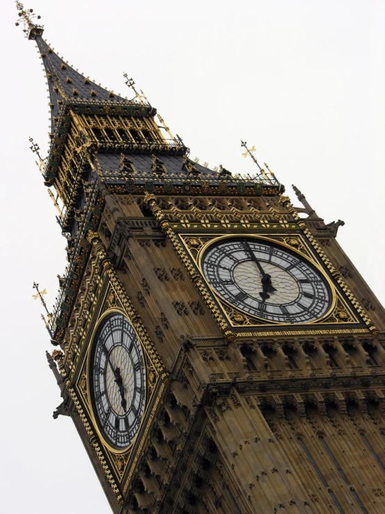 the large clock is built on the side of the building