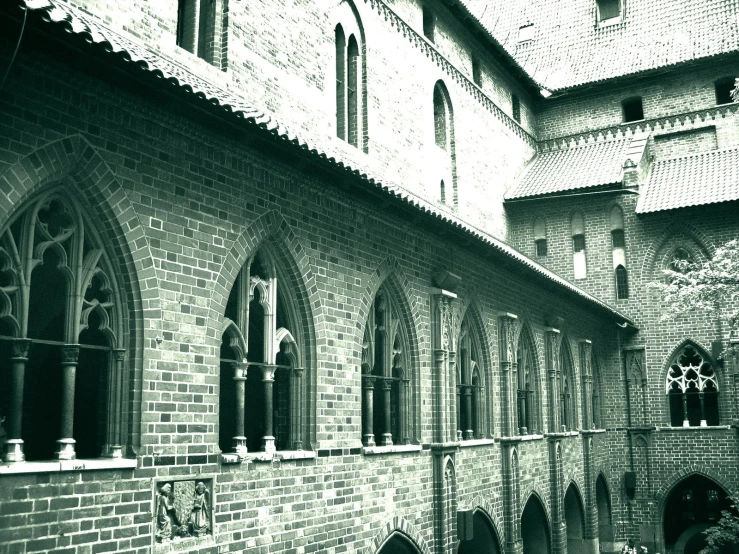 view of stone church from courtyard looking in