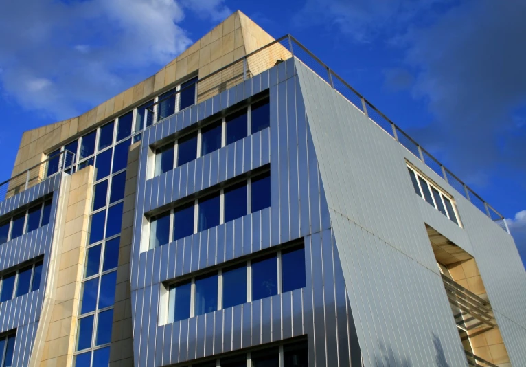 an office building with some very tall windows