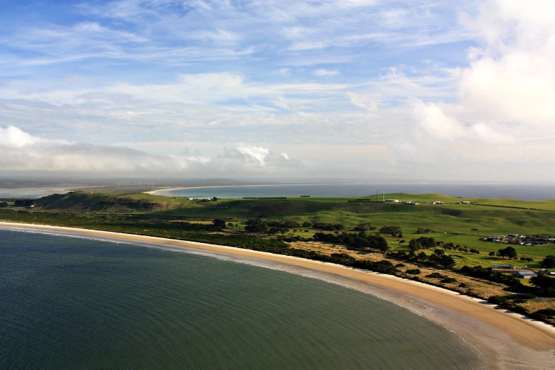 an aerial view of an island near the ocean