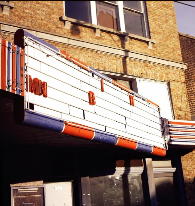 an old building with the word big momma painted on the side