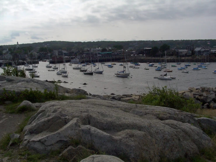 several boats floating on the water in the ocean