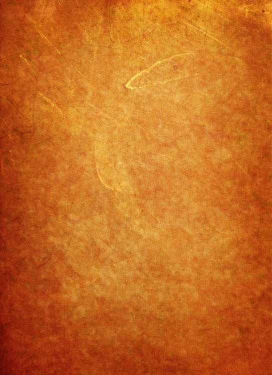 an orange wall with scratches in the corner