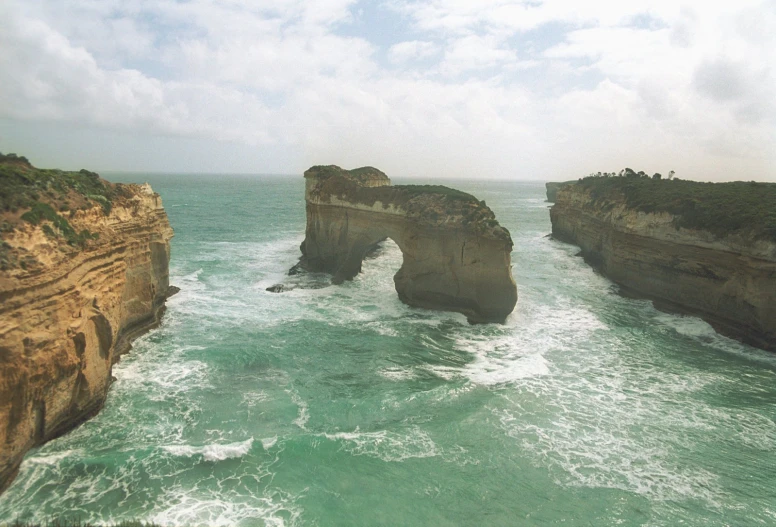 there are two large cliffs on the shore