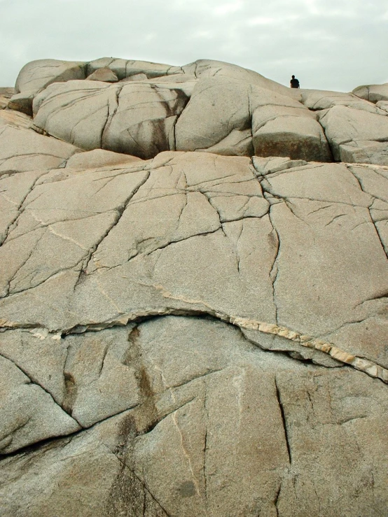 the large rocks are covered in water and s