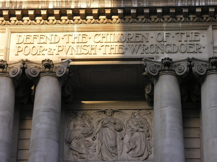 an old building with pillars on either side