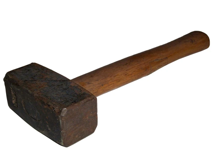 a large old wooden hammer on a white background