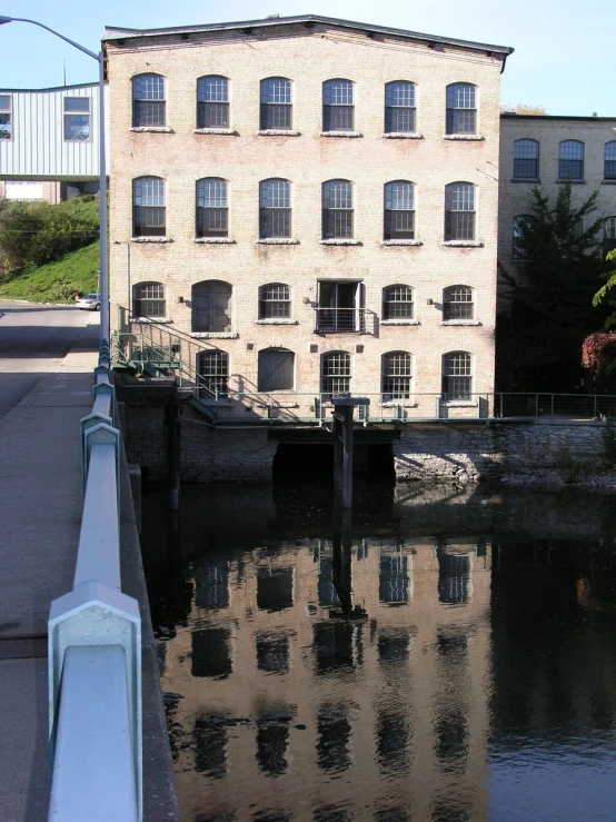 two water pipes running between buildings and a building