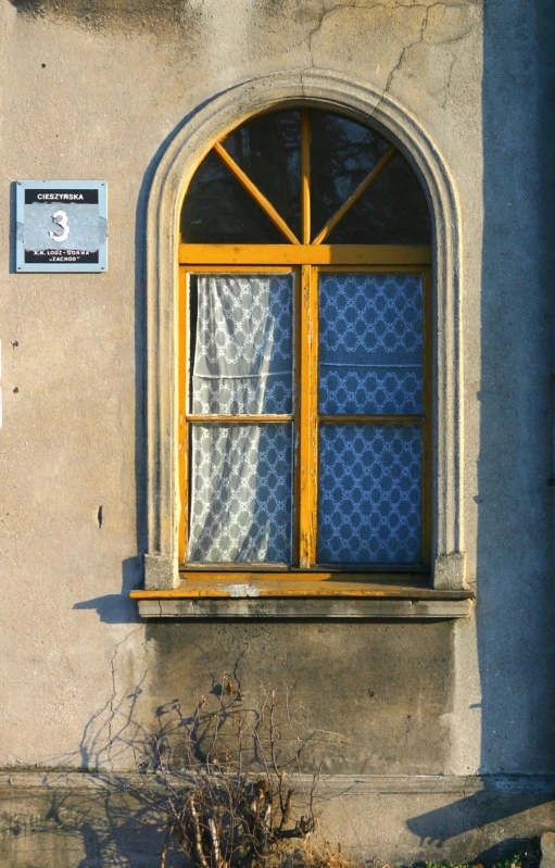 an image of a window with curtains in it