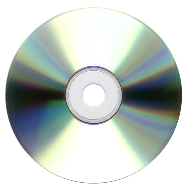 a white cd with a green disk on top