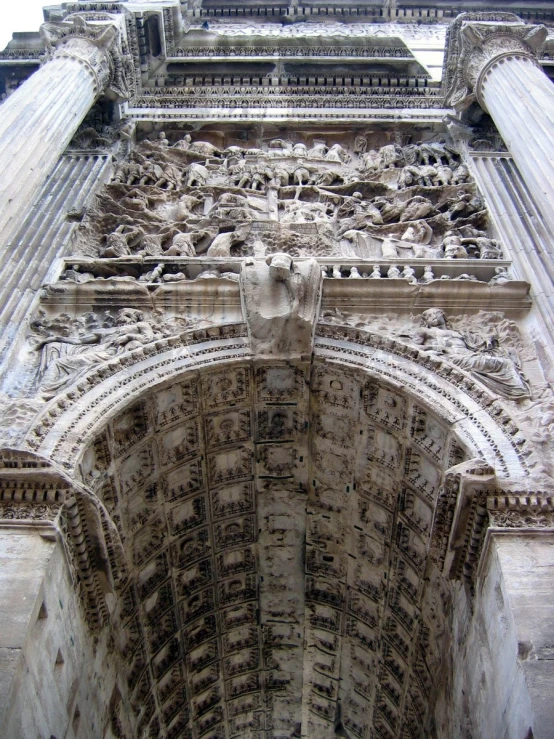 a cathedral entrance with intricate carvings on the wall