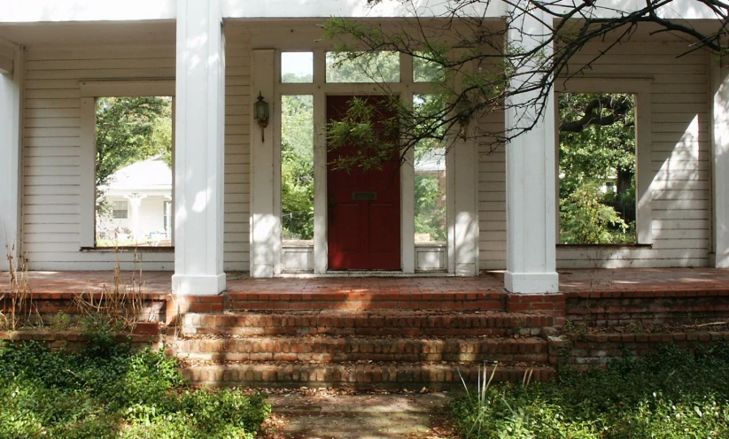 there is a red front door of the house