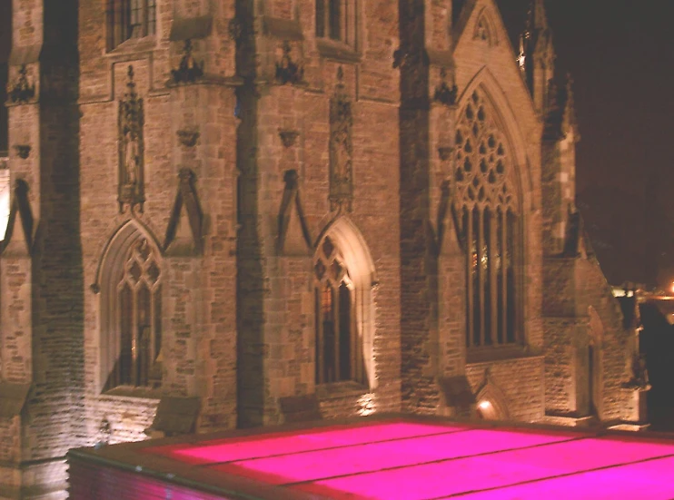 an image of a red light in front of a building