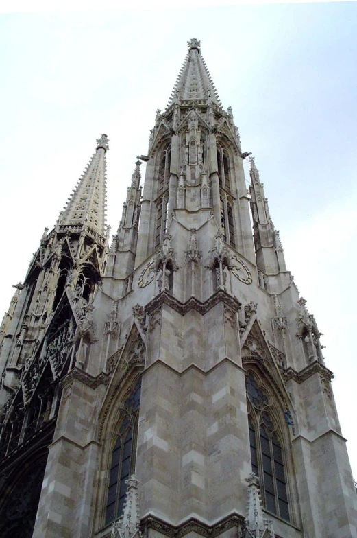 a very tall, elegant building with ornate architecture