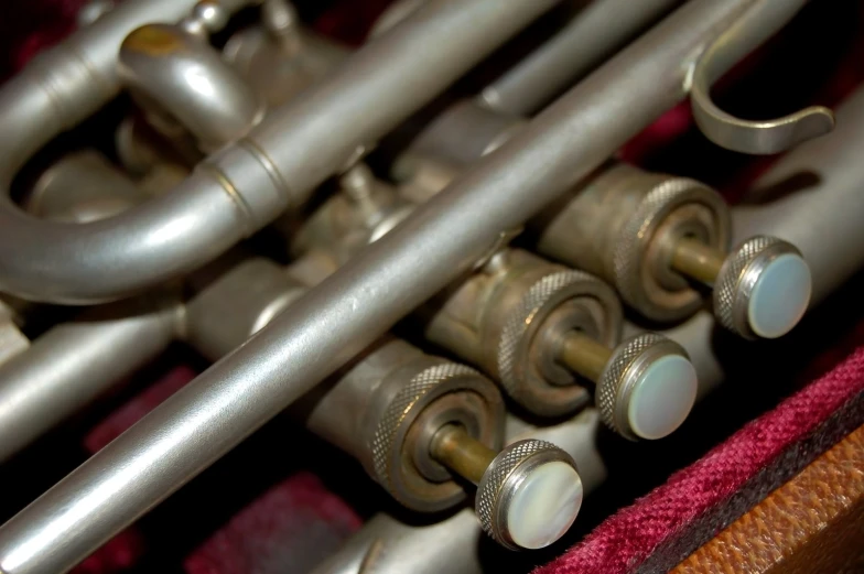 the pipe of an instrument on display has silver s