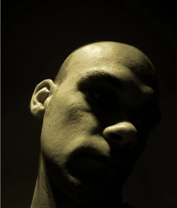 a man with a nose like a human head