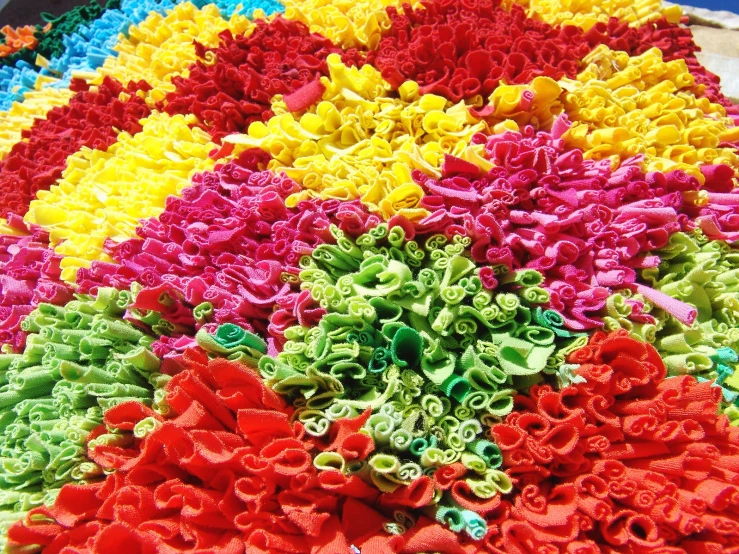 a display of brightly colored flower like shapes