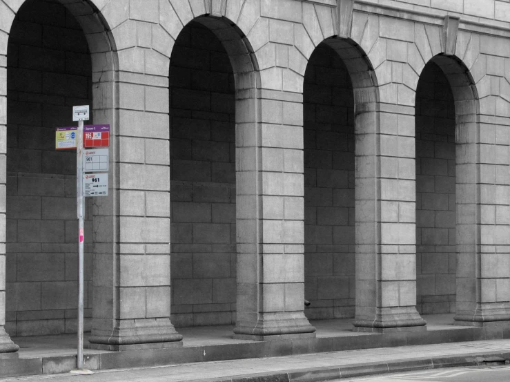 a city street with multiple arched arches next to it