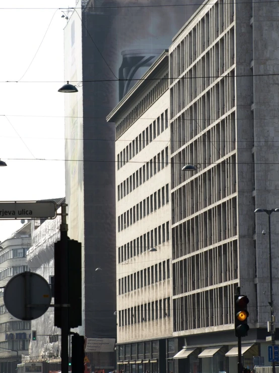 a city scene of buildings and street lights