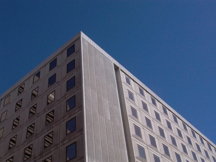 looking up at the side of an office building