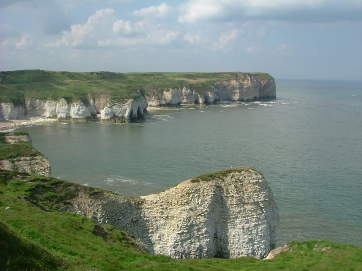 a picture taken from an overlook point with the water and land