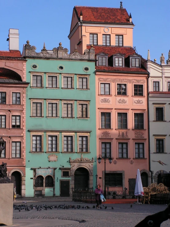 several colored buildings in front of each other