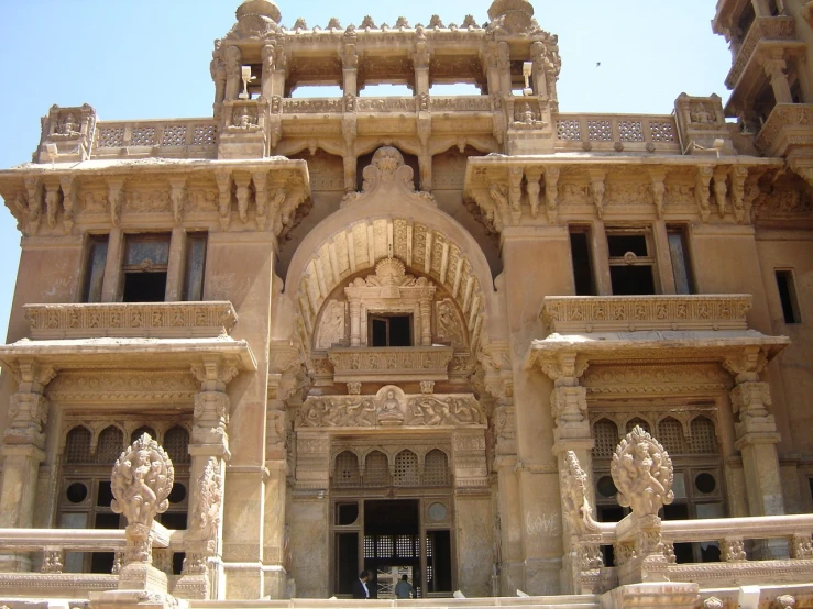 a very large, elaborate building with stonework