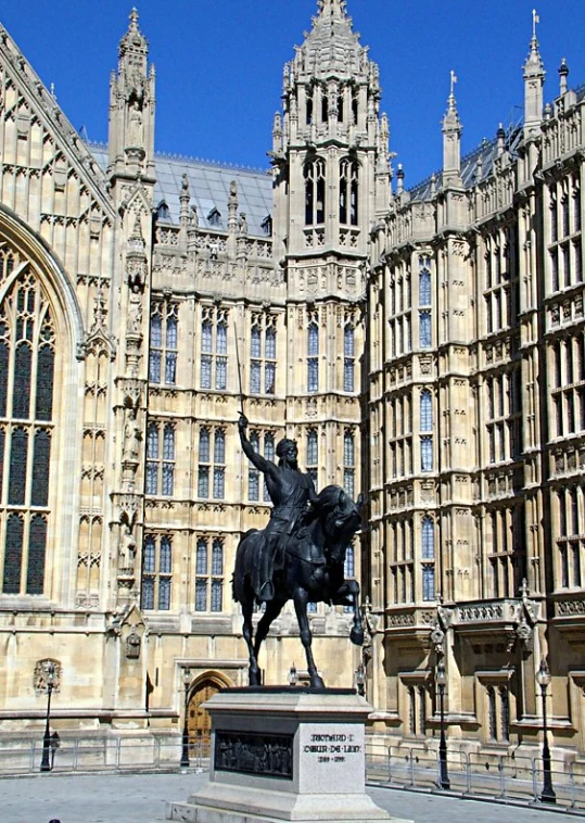 a statue of a man riding on the back of a horse