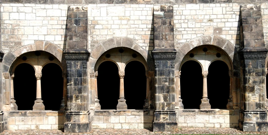 arches and archways surround an old stone building