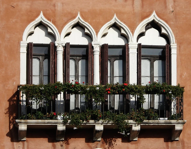 a large window with windows and shutters in front of it