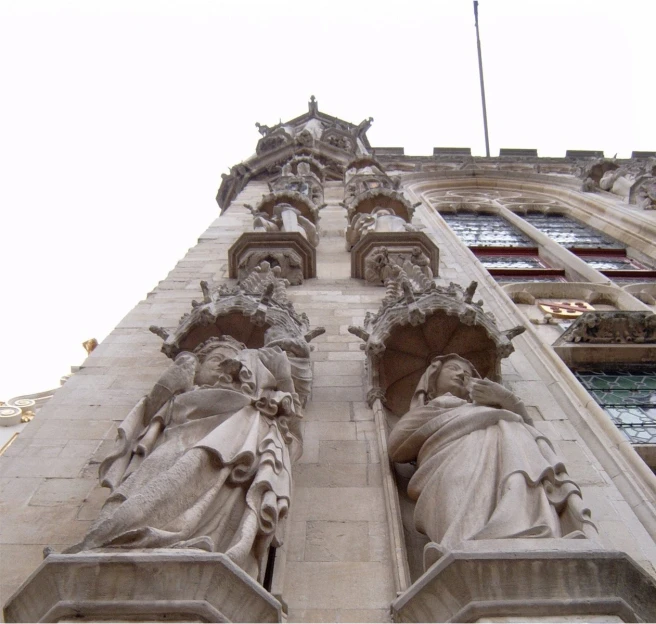 statues of people standing on top of each other