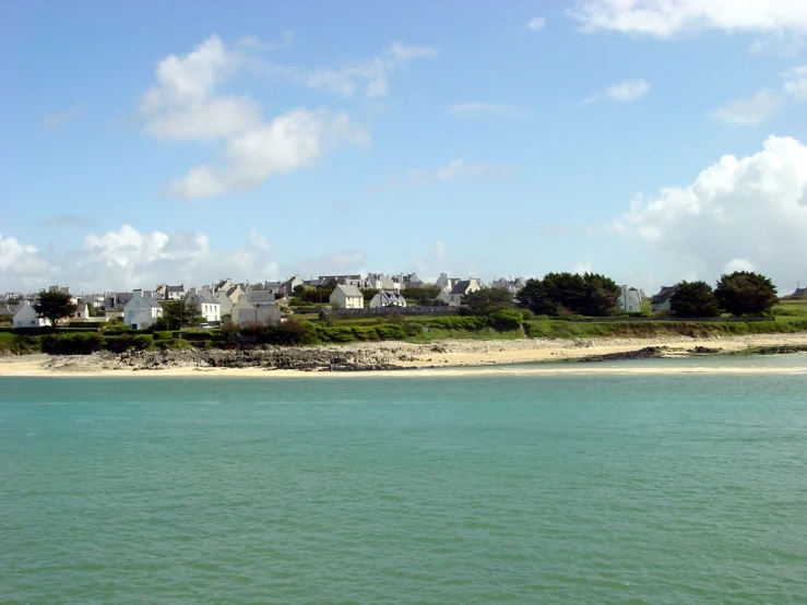 houses on land on the other side of the water