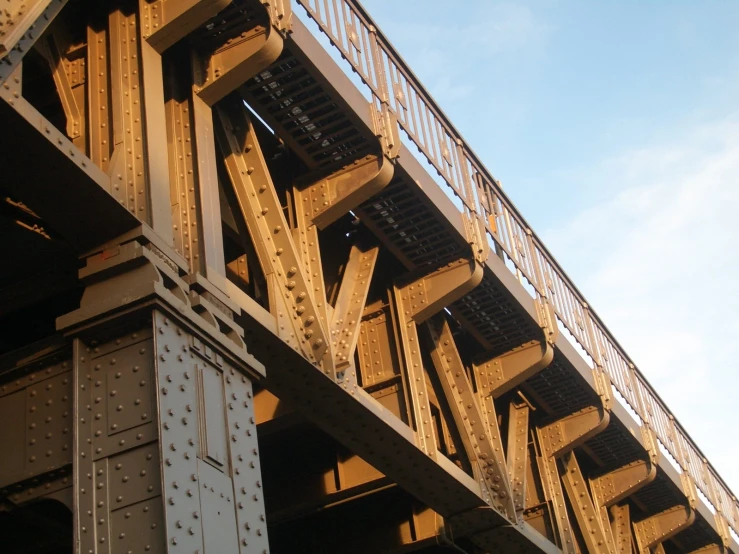 view looking up from below an elevated steel structure