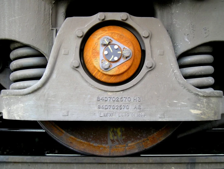 the front wheels of a train wheel on top of a track