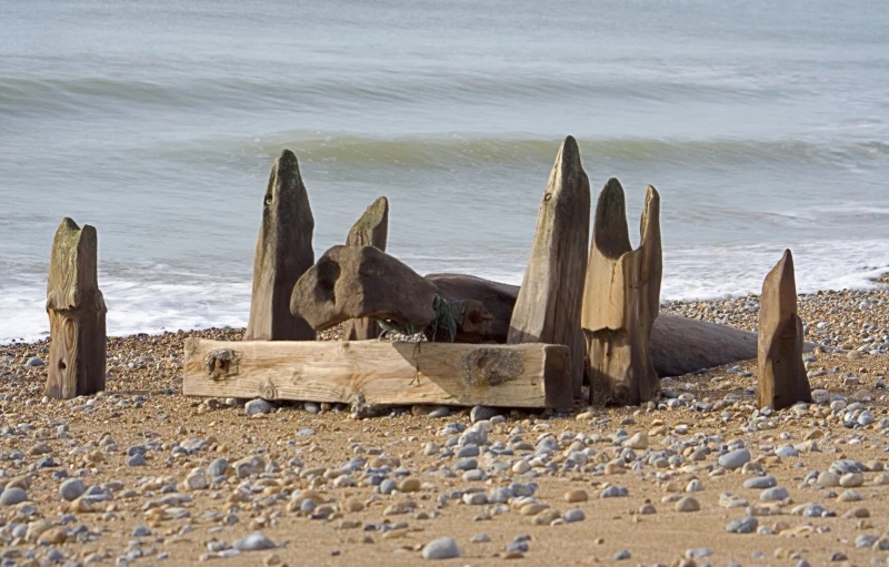 a close up of some rocks on the beach