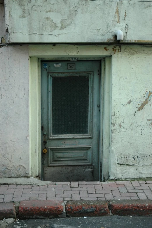 the doors and brick walk are closed by the door