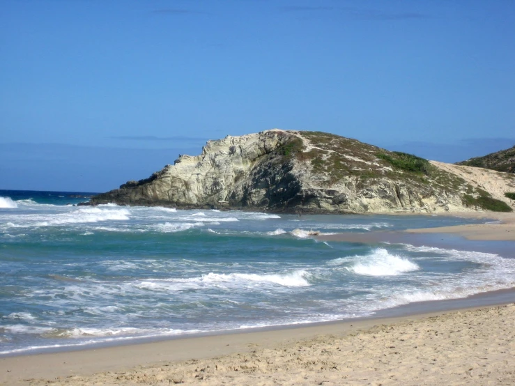 a body of water with waves on top of it