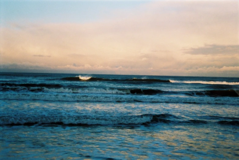 there is a picture of an ocean with waves