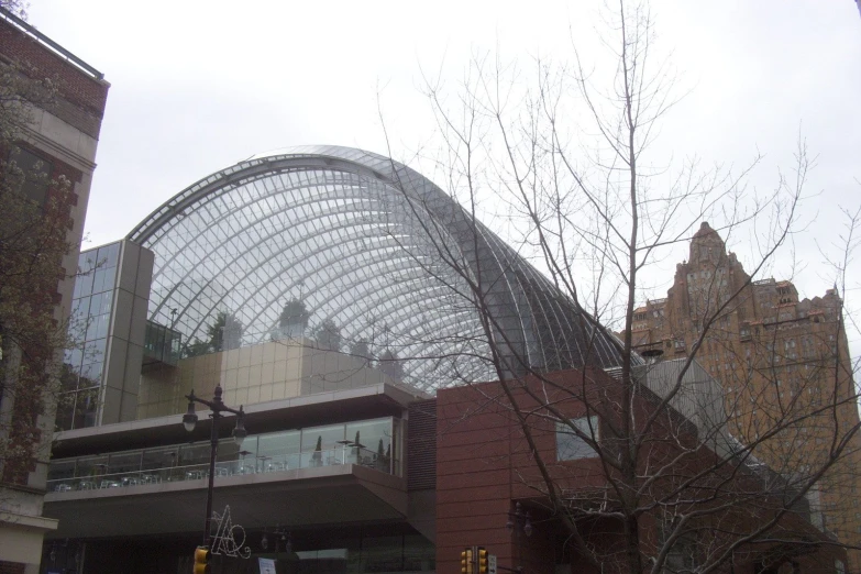 building with glass facade in urban area in winter