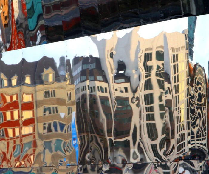 an abstract pograph shows a reflection of buildings in a mirror