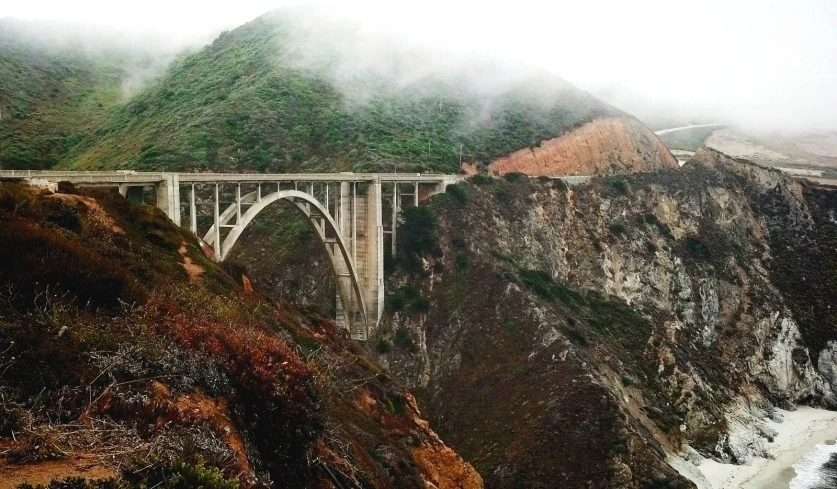 fog rolls over the canyon on an autumn day