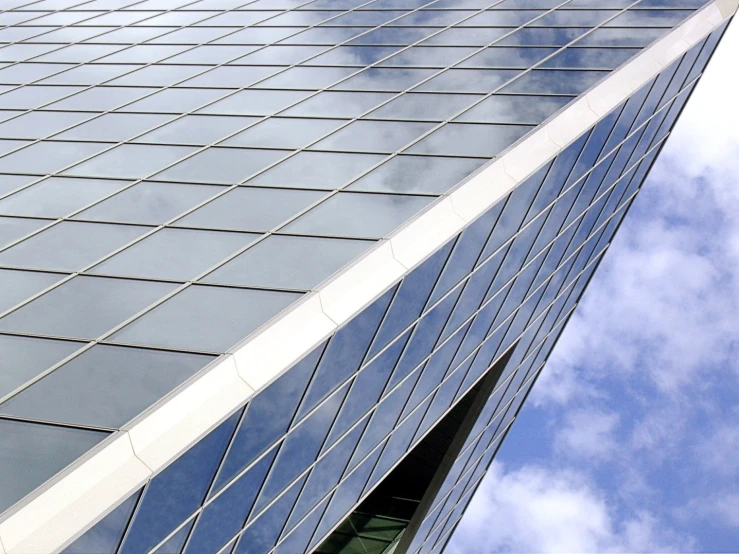 a building with many lines and a sky background