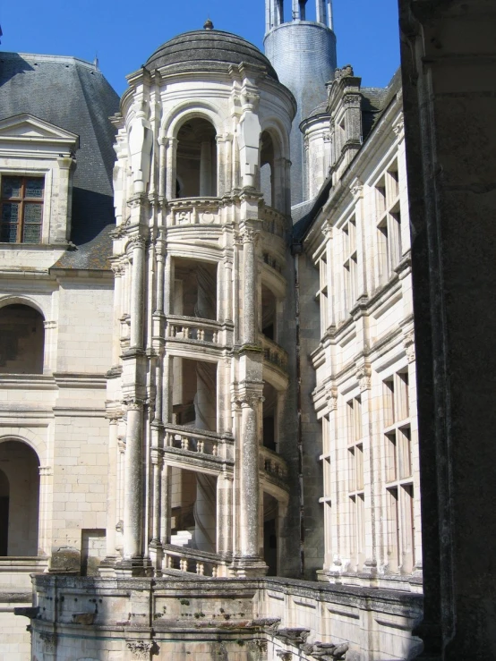 old white architectural structures on a bright sunny day