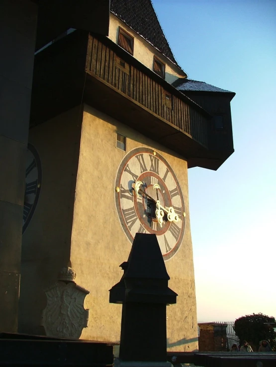 a clock tower has the face of a dog on it