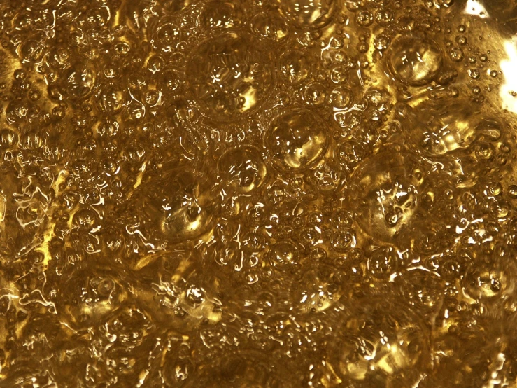 a yellow liquid or substance is seen from above