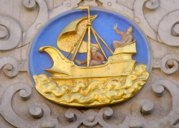 a carving is on the side of a building