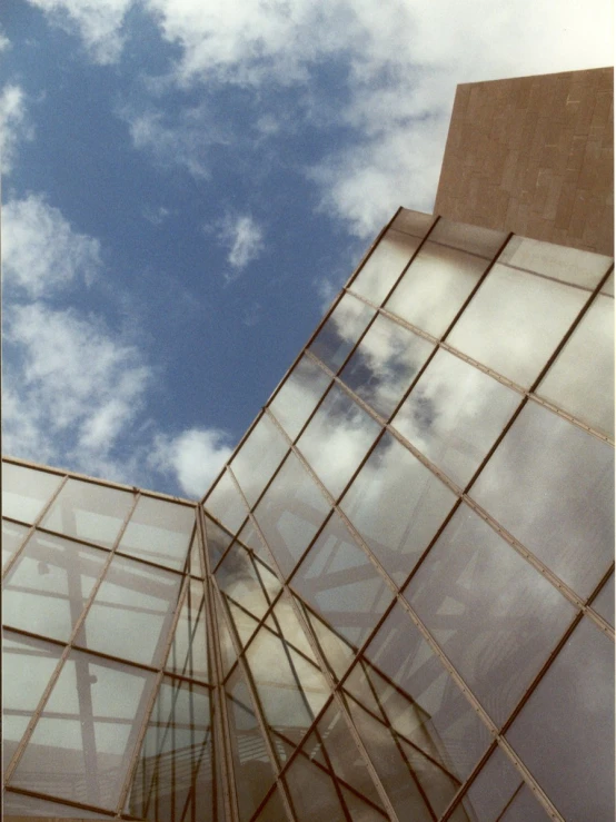 a big building with some windows near by